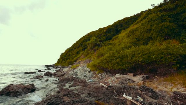 Coastline, Ocean with rocks jutting out of the water.