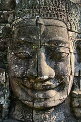 Fototapeta na wymiar Stone face on the Bayon temple in Angkor Wat Cambodia