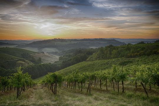 Sunrise over the tuscany hills