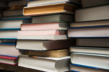 Old books on book shelf background