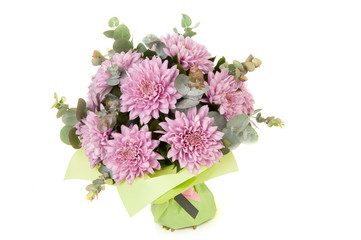 pink dahlia and aster in a paper bouquet tied ribbon on a white background. Valentine's Day