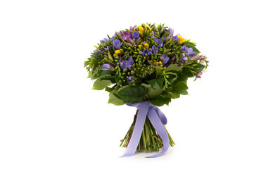 purple and yellow crocus bouquet tied  ribbon on a white background. Valentine's Day