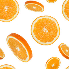 Flying orange slices isolated on white, seamless pattern