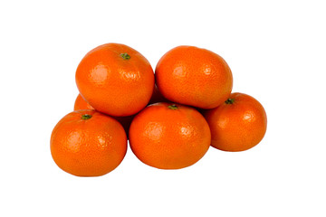 Group closeup of ripe tangerines on a white background. Clementine. Citrus. Fresh fruit. Diet. The orange fruit. Colorful food and drink, even the concept of life. isolated