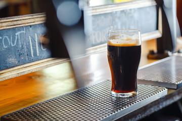 Stout ale on a bar counter