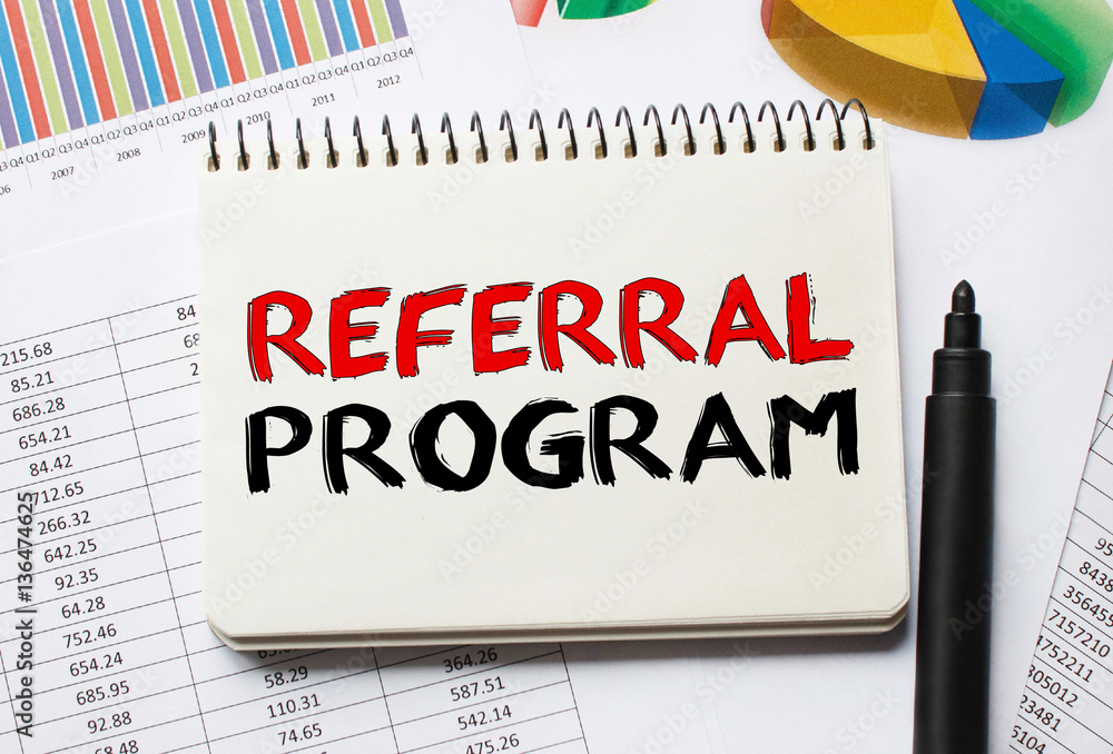 Poster notebook with toolls and notes about referral program