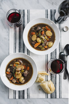 Overhead view of beef stew with vegetables severed in bowl