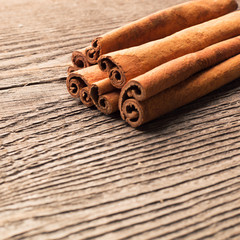 Some cinnamon sticks on the wooden table
