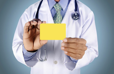 Doctor holding card with stethoscope isolated on color backgroun