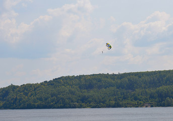 sky paragliding kite sport parachute  river flight clouds entertainment 