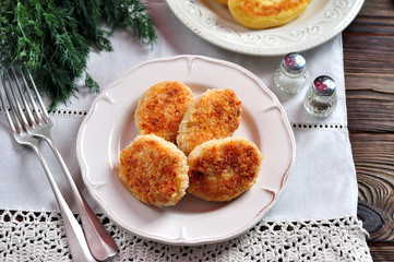 Chicken burgers(cutlets), breaded panko baked in the oven.