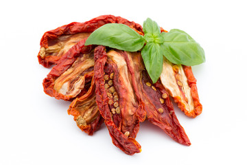Dried tomatoes isolated on white background.