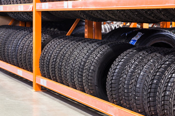 new winter studded  tires for sale at booth in store.