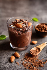 Nutritious chocolate chia seeds pudding in a glass jar