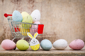 Easter eggs in the cart. Spring discount card.