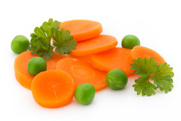 Carrot slice, green peas, isolated on white.