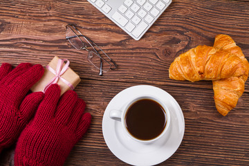 sweet croissants and coffee cup