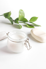 natural organic cosmetics with herbs for baby on white background