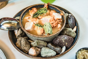 A Peruvian fish stew like no other, kept warm with surrounding hot rocks