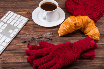 Coffee cup and sweet croissants
