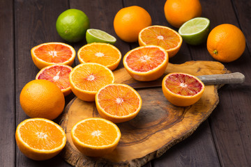 Fototapeta na wymiar Slices of orange and citrus. Top view