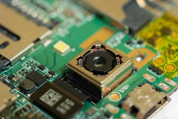 smartphone camera module. disassembled phone.