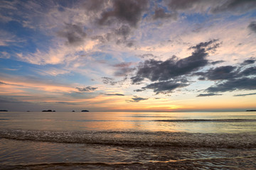 Naklejka na ściany i meble Coast of the sea at colorful sunset Koh Chang, Thailand. Beach s