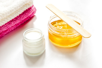 wax for depilation on white background