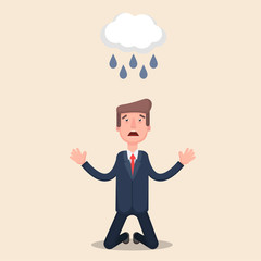 A man on his knees crying.