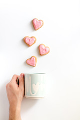 cookies for Valentine Day heartshaped white background top view pattern