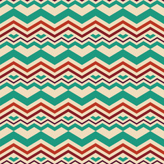 Ethnic zigzag seamless pattern with geometric hearts. Vector illustration.