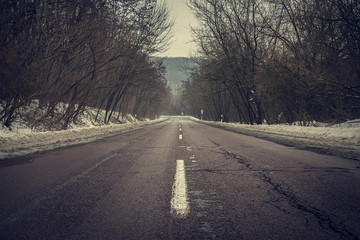 Obraz premium Vintage photo of road a winter's day