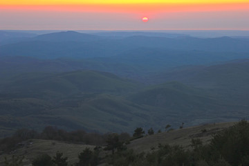 Belt of Venus during sunrise in mountains