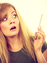 Obraz premium Crazy young woman talking on phone