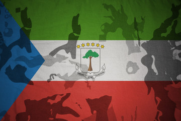 flag of equatorial guinea on the khaki texture . military concept