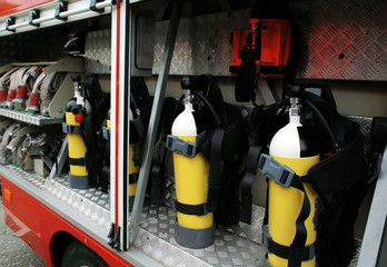 Oxygen cylinders in fire-fighting vehicle