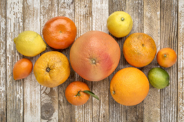 citrus fruit collection on weathered wood