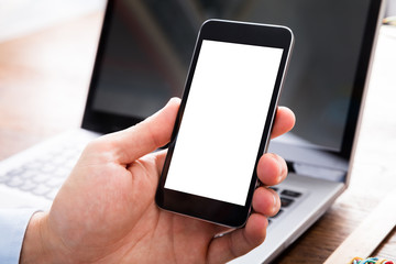 Person Hand Using Mobile Phone