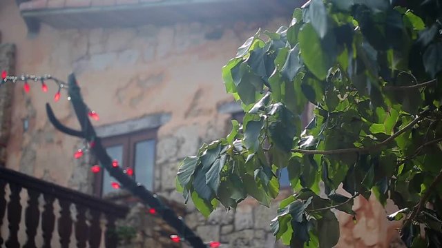 Building in medieval city on background