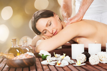 Obraz na płótnie Canvas Relaxed Woman Receiving Shoulder Massage