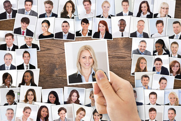 Person Hand Selecting Candidate Photo