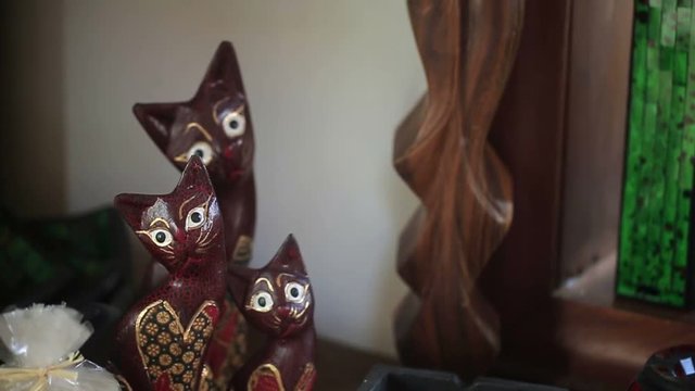 Wooden colorful cats decoration shot