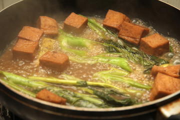 Cooking , Fried kale with tofu.