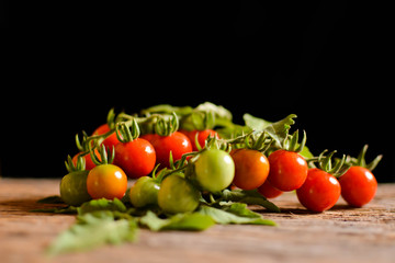 Stil life group of tomato on old wood