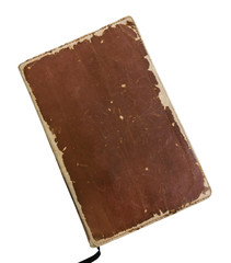 Worn vintage leather book, weathered from reading and use, isola