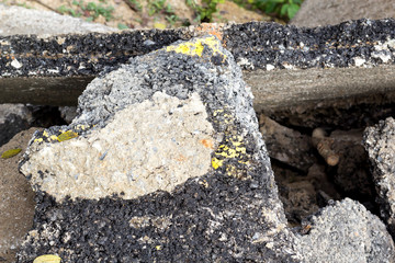Old cracked asphalt road scrap heap damage