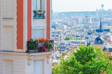 Beautiful european houses and balcony view in Paris, France. View to the city from Montmartre