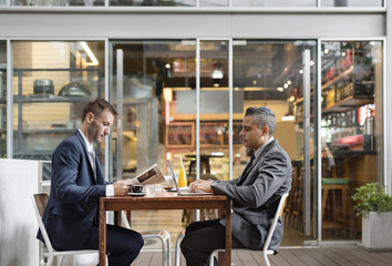 Two Businessmen Cafe Break Concept