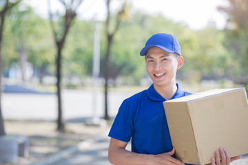 deliveryman stand and smile