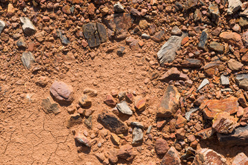 Soil texture, brown ground soil texture mixed with small rocks